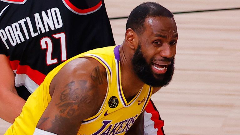 LeBron James drives by Jusuf Nurkic in the Lakers' Game 5 win over the Trail Blazers