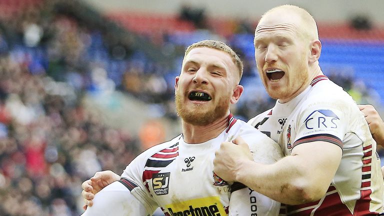 Picture by Chris Mangnall/SWpix.com - 23/02/2020 - Rugby League - Betfred Super League - Wigan Warriors v Hull FC - DW Stadium, Wigan, England -
Wigan's 3rd try scorer Jackson Hastings (L)) celebrates with Liam Farrell