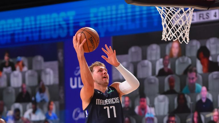 Luka Doncic of the Dallas Mavericks shoots the ball against the Houston Rockets