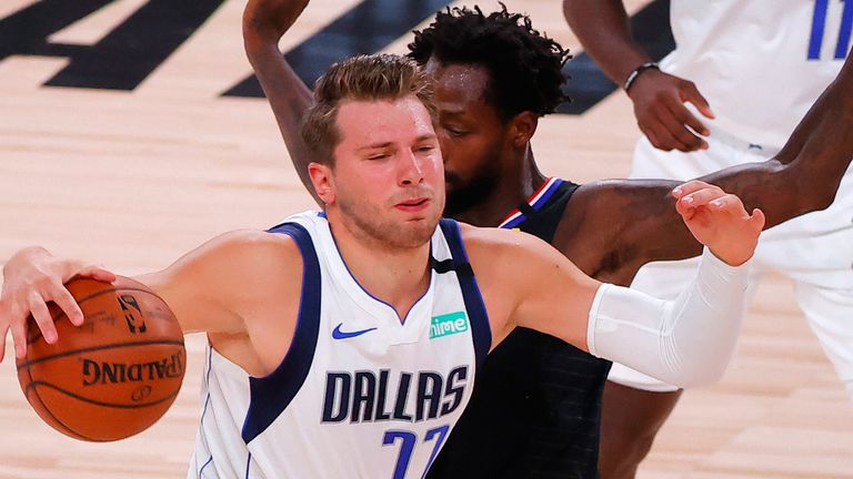 Patrick Beverley guards Luka Doncic in Game 1 of the Western Conference first round playoff series between the Dallas Mavericks and the LA Clippers