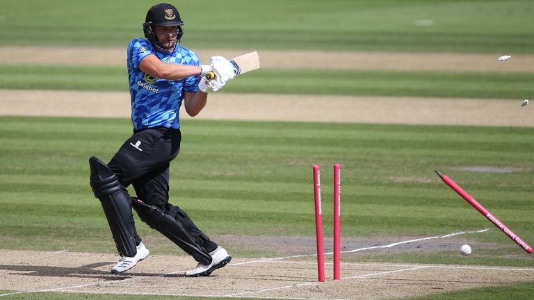 Luke Wright of Sussex Sharks is bowled out by Gus Atkinson of Surrey during the Vitality T20 Blast match between Sussex Sharks and Surrey at The 1st Central County Ground on August 28, 2020 in Hove, England. 