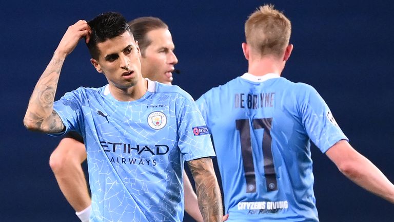 Joao Cancelo reacts during City's loss to Lyon