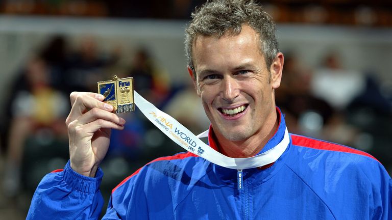 INDIANAPOLIS - OCTOBER 9: Mark Foster of Great Britain poses with his gold medal in the Men's 50m Freestyle final during the FINA World Swimming Championships at the Conseco Fieldhouse on October 9, 2004 in Indianapolis, Indiana. (Photo by Harry How/Getty Images)