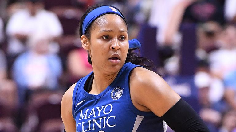 Maya Moore controls possession during a 2018 Minnesota Lynx game