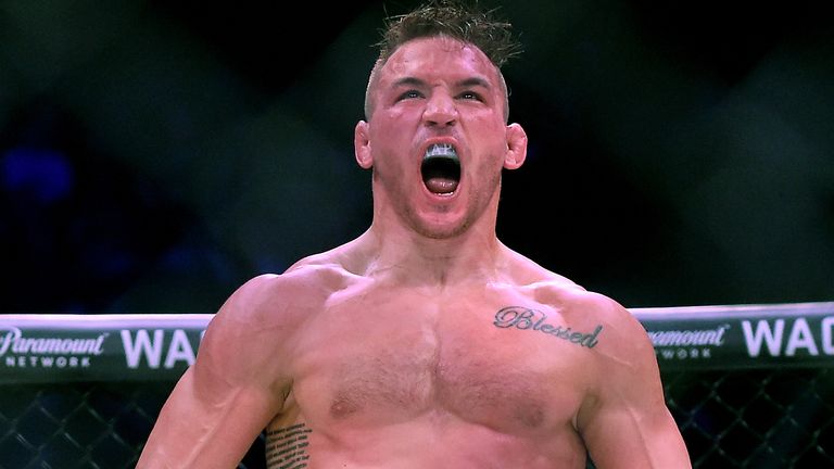 Michael Chandler Jr (red gloves) celebrates after defeating Goiti Yamauchi (blue gloves) in their Lightweight fight at Bellator 192 at The Forum on January 20, 2018 in Inglewood, California. Michael Chandler Jr won by unanimous decision