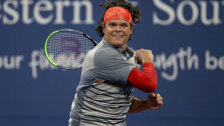 Milos Raonic of Canada returns a shot to Andy Murray of Great Britain during the Western & Southern Open at the USTA Billie Jean King National Tennis Center on August 25, 2020 in the Queens borough of New York City