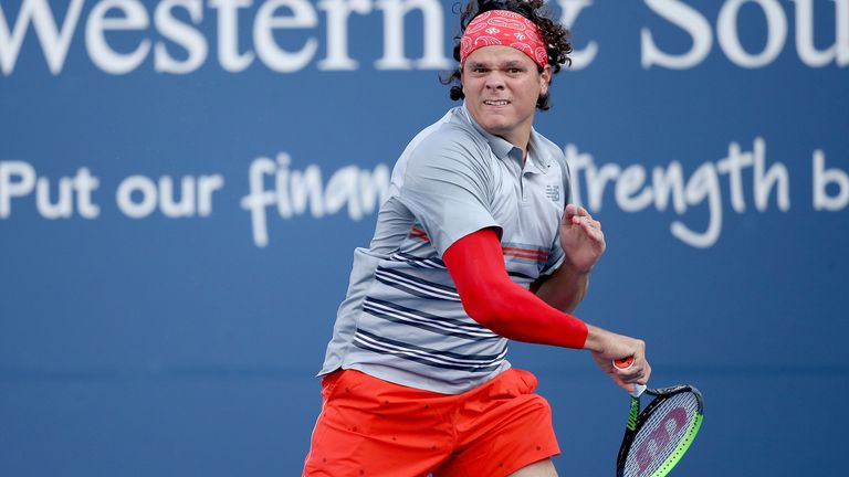 Milos Roanic of Canada returns a shot to Andy Murray of Great Britain during the Western & Southern Open at the USTA Billie Jean King National Tennis Center on August 25, 2020 in the Queens borough of New York City.