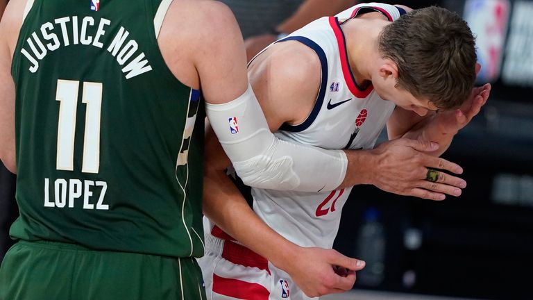 Moe Wagner reacts after being head-butted by Giannis Antetokounmpo