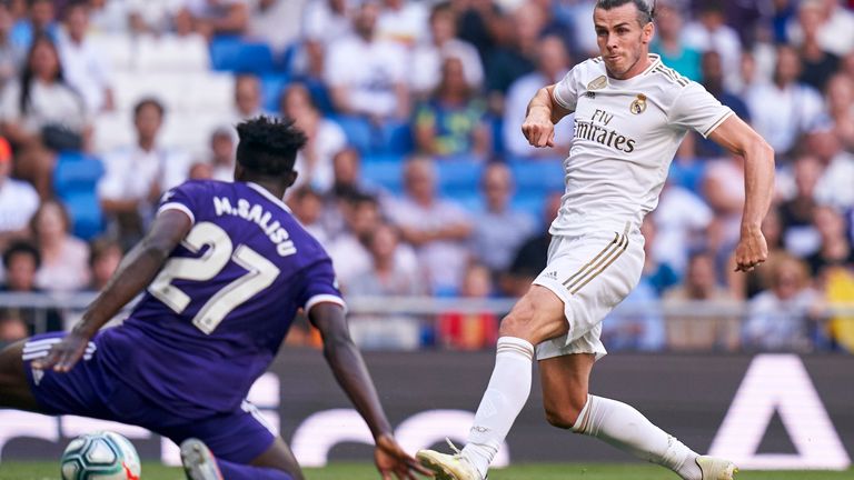 Real Valladolid's Mohammed Salisu attempts to block a shot from Real Madrid's Gareth Bale