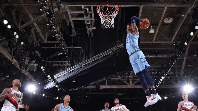 Ja Morant of the Memphis Grizzlies dunks the ball against the Portland Trail Blazers 