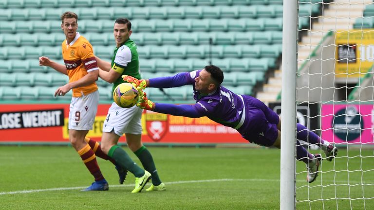 EDINBURGH, SCOTLAND - AUGUST 15: Hibernian&#39;s Ofir Marciano makes a great save from Callum Lang  during the Scottish Premiership match between Hibernian and Motherwell at Easter Road on August 15, 2020, in Edinburgh, Scotland.  .(Ross MacDonald / SNS Group)