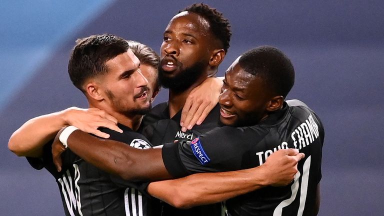 Moussa Dembele celebrates scoring for Lyon vs Man City