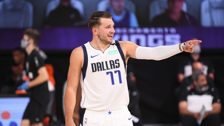 A Luka Doncic triple-double saw the Dallas Mavericks edge out the Sacramento Kings 114-110 in overtime.