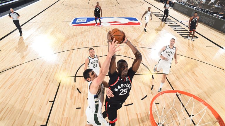 Chris Boucher powered home his dunk shot as Toronto extended their lead over Milwaukee in the fourth quarter of their NBA clash.