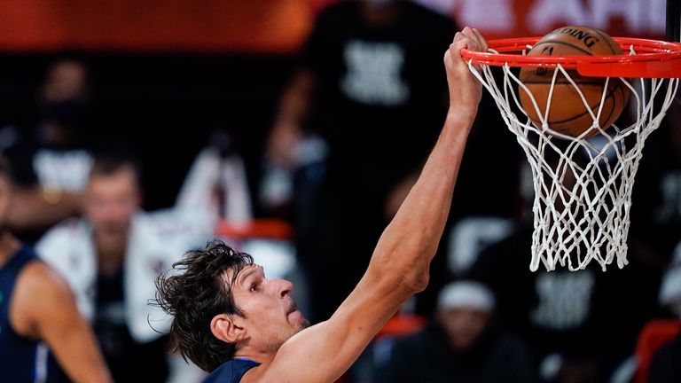 Boban Marjanovic #51 of the Dallas Mavericks dunks the ball against the Phoenix Suns during the first half at Visa Athletic Center at ESPN Wide World Of Sports Complex on August 2, 2020 in Lake Buena Vista, Florida. 