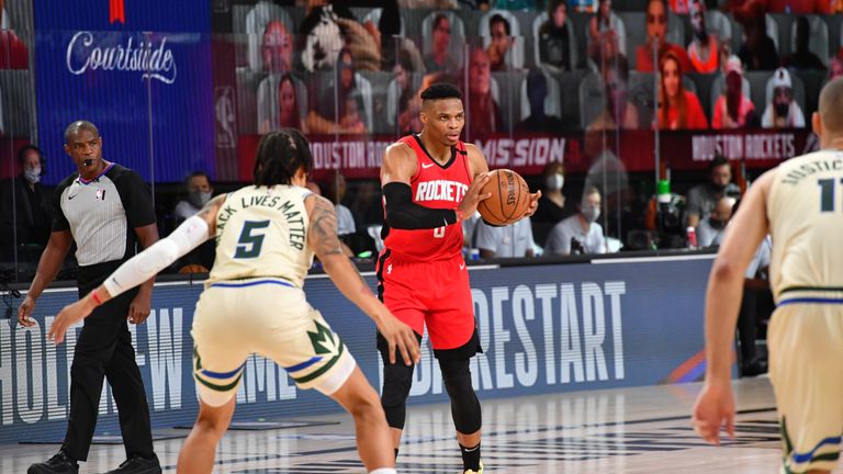  Russell Westbrook #0 of the Houston Rockets handles the ball against the Milwaukee Bucks on August 2, 2020 at The Arena at ESPN Wide World Of Sports Complex in Orlando, Florida. 