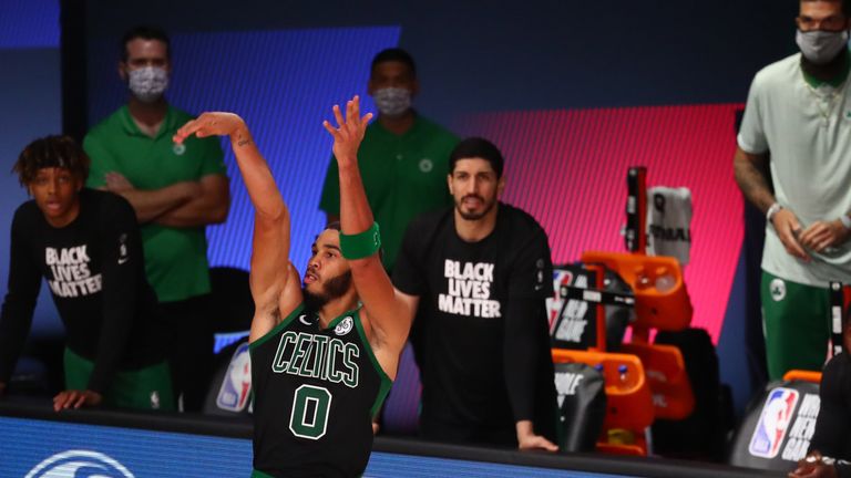 Jayson Tatum #0 of the Boston Celtics ties the game in the fourth quarter of a NBA basketball game against the Orlando Magic at AdventHealth Arena at the ESPN Wide World Of Sports Complex on August 9, 2020 in Lake Buena Vista, Florida.