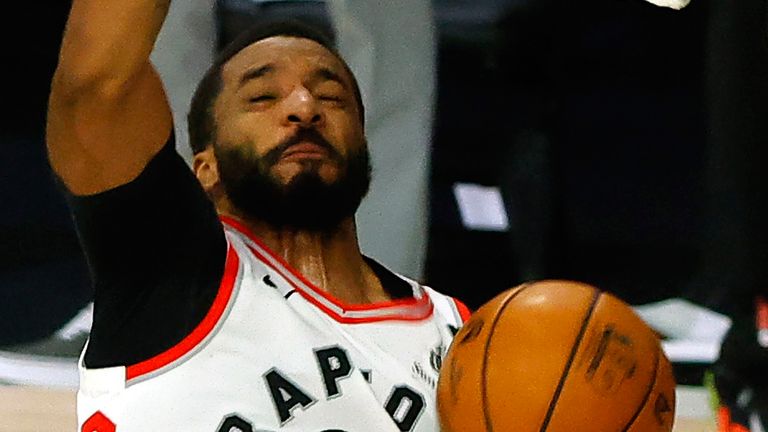 Norman Powell throws down a dunk against the Brooklyn Nets