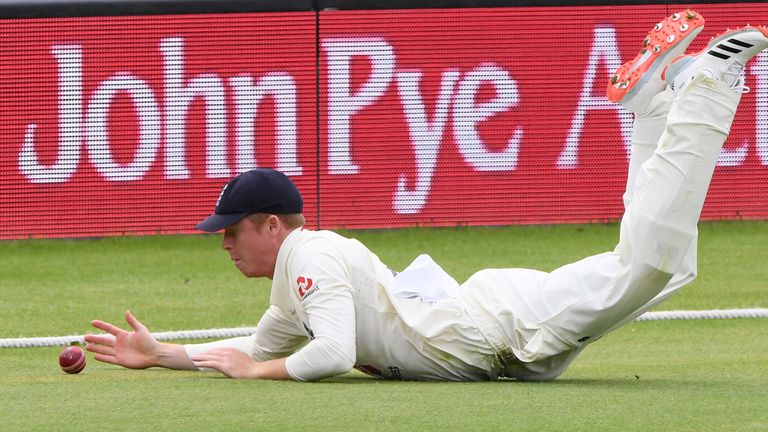  Ollie Pope of England dives to stop a boundary during Day Three of the 3rd #RaiseTheBat Test Match between England and Pakistan at the Ageas Bowl on August 23, 2020 in Southampton, England.