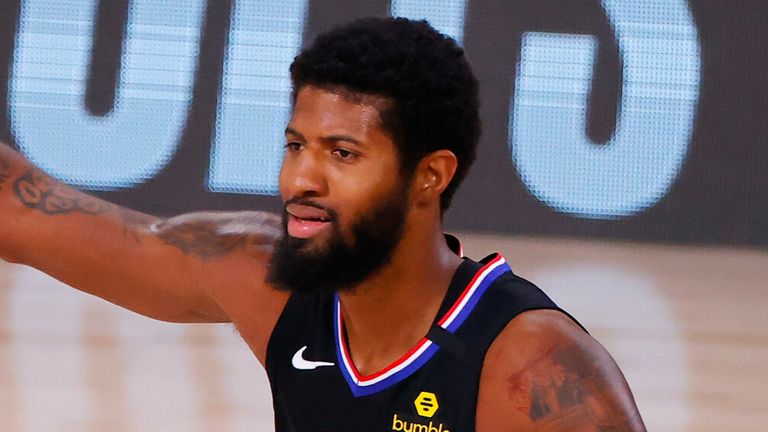 Paul George signals to a Clippers team-mate during Game 1 against the Mavericks