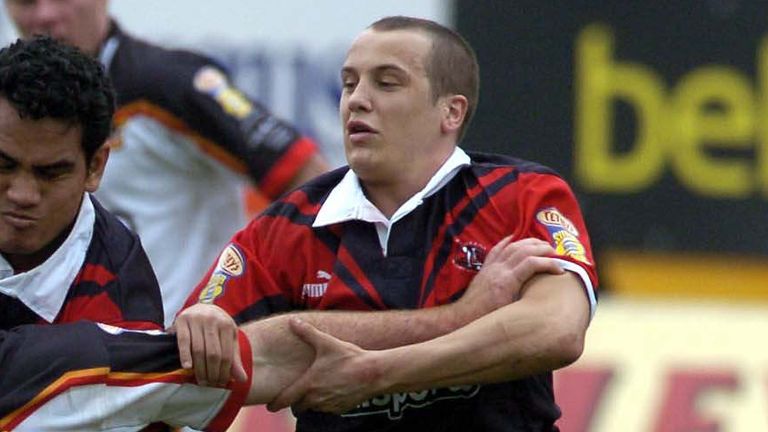 Pix: Ben Duffy/SWpix.com...Rugby League Super League - Bradford Bulls v St Helens.......12/03/2004..Bradford's Rob Parker is halted by St Helen's Phil Anderton and Maurie Fa'asvalu..?COPYRIGHT PICTURE>>SIMON WILKINSON>>08700920092>>.