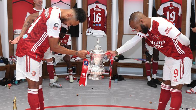 Aubameyang and his close friend Alexandre Lacazette toast their success