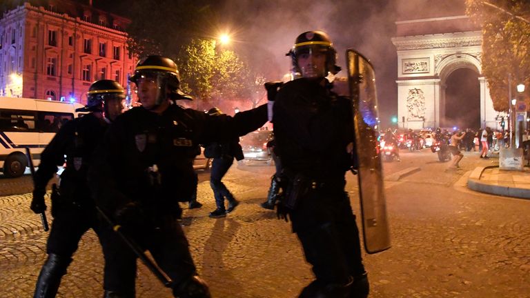 Police called to deal with PSG fans at the Champs Elysee