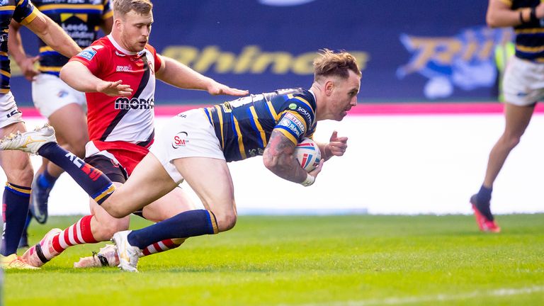 Richie Myler bursts free to score a try against Salford.