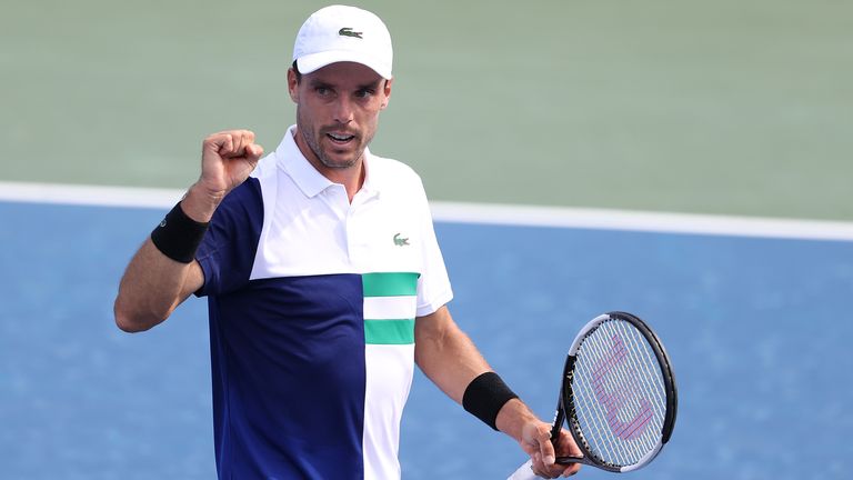 Robert Bautista Agut of Spain celebrates his three set win against Danill Medvedev of Russia during the Western & Southern Open at the USTA Billie Jean King National Tennis Center on August 26, 2020 in New York City