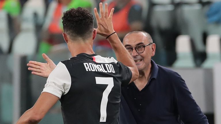 TURIN, ITALY - JULY 20: Cristiano Ronaldo of Juventus celebrates with his coach Maurizio Sarri after scoring the opening goal during the Serie A match between Juventus and SS Lazio at Allianz Stadium on July 20, 2020 in Turin, Italy. (Photo by Emilio Andreoli/Getty Images)