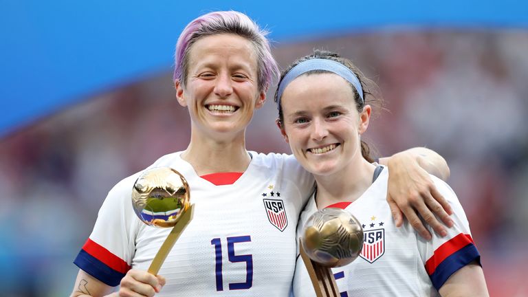 Rose Lavelle (R) celebrates with team-mate Megan Rapinoe following the USA’s win over the Netherlands in the World Cup final in July, 2019. 