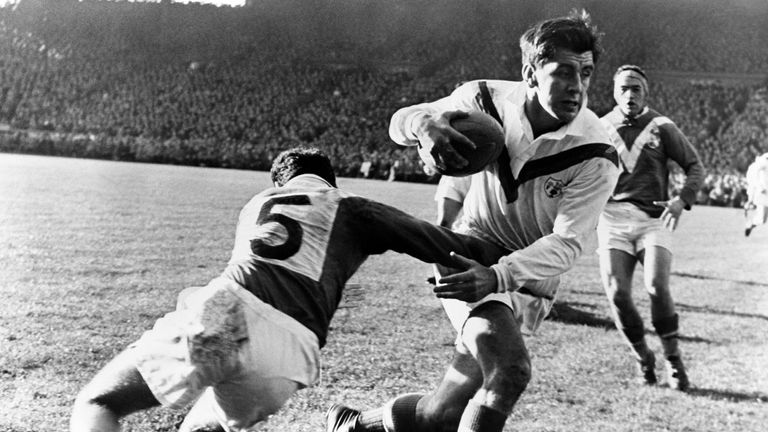 Rugby League - World Cup - Final - France v Great Britain - Parc des Princes
Great Britain's Dave Valentine (r) breaks a tackle from France's Raymond Contrastin (l)