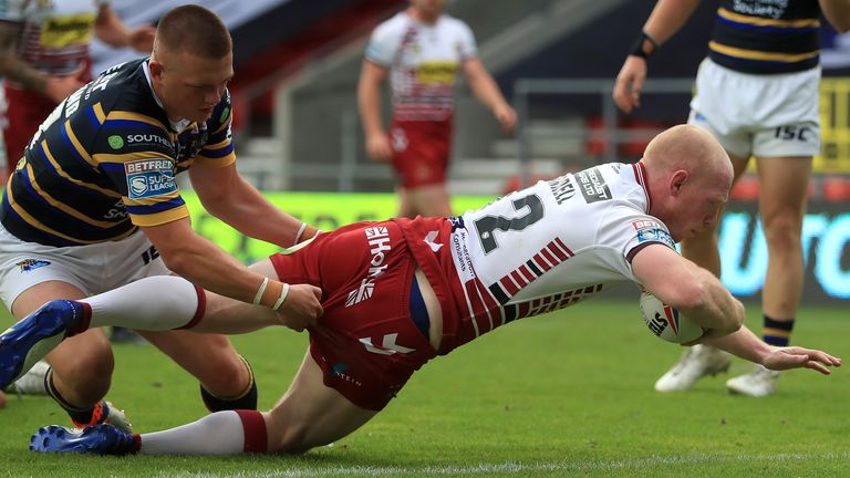 Liam Farrell scores a try against Leeds