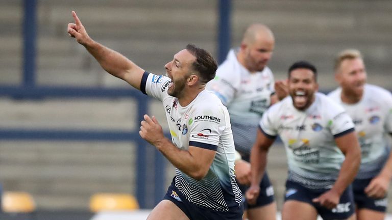 Leeds Rhinos' Luke Gale (left) celebrates s ring the winning drop goal during the Betfred Super League match at Emerald Headingley Stadium, Leeds.