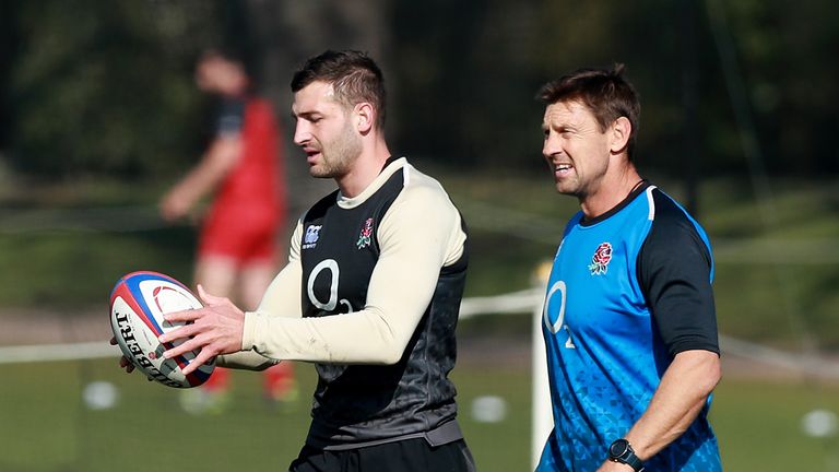 OXFORD, ENGLAND - FEBRUARY 27: Jonny May (L) talks with attack coach Scott Wisemantel during the England training session held at St. Edwards's School on February 27, 2019 in Oxford, England. (Photo by David Rogers/Getty Images)