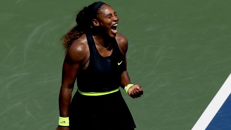 Serena Williams celebrates a point while playing Arantxa Rus of Netherlands during the Western & Southern Open at the USTA Billie Jean King National Tennis Center on August 24, 2020 in the Queens borough of New York City.