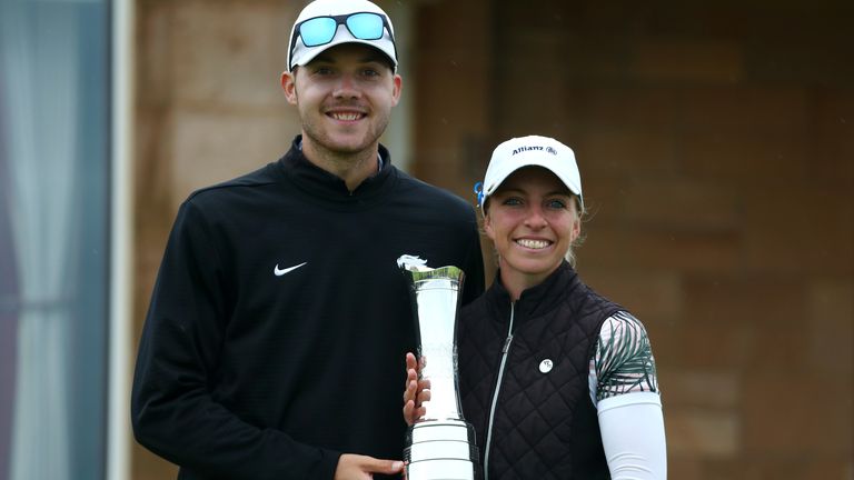 Sophia.Popov of Germany (R) and boyfriend/caddie Maximilian Mehles pose with the trophy following the final round during Day Four of the 2020 AIG Women's Open at Royal Troon on August 23, 2020 in Troon, Scotland. (Photo by R&A - Handout/R&A via Getty Images)