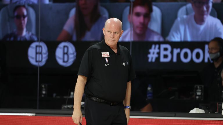 Spurs coach Gregg Popovich, Magic's Jonathan Isaac stand for
