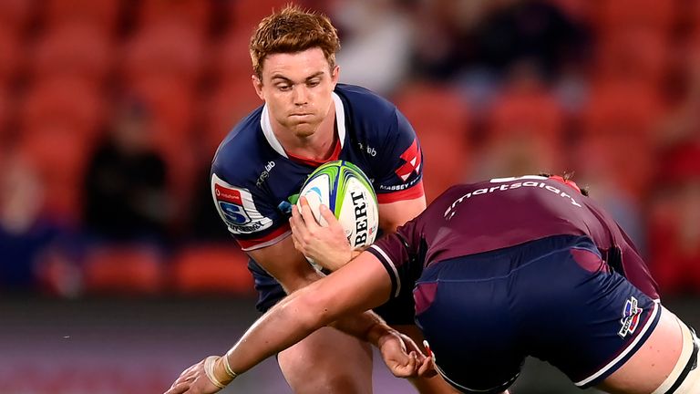 BRISBANE, AUSTRALIA - AUGUST 15: Andrew Kellaway of the Rebels is tackled during the round seven Super Rugby AU match between the Queensland Reds and the Melbourne Rebels at Suncorp Stadium on August 15, 2020 in Brisbane, Australia. (Photo by Albert Perez/Getty Images)