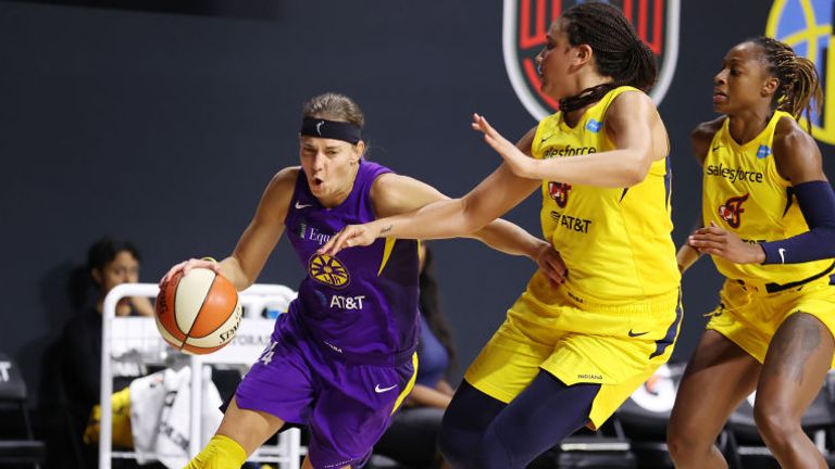 Sydney Wiese of the Los Angeles Sparks drives to the basket against the Indiana Fever