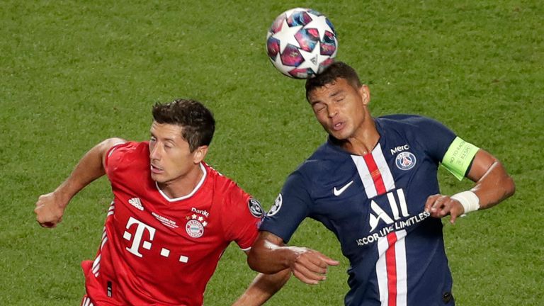 Robert Lewandowski and Thiago Silva compete for the ball in the Champions League final