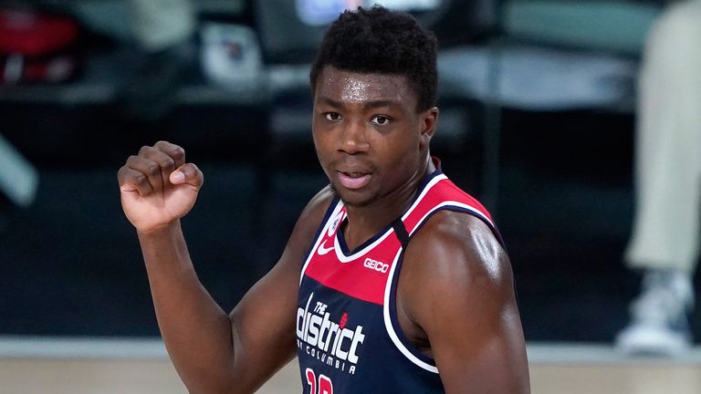 Thomas Bryant celebrates a play during the Wizards' win over the Celtics