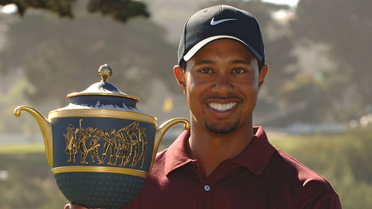 Tiger Woods holding the Gene Sarazen trophy after winning The World Golf Championships 2005 American Express Championship at Harding Park Golf Club in San Francisco