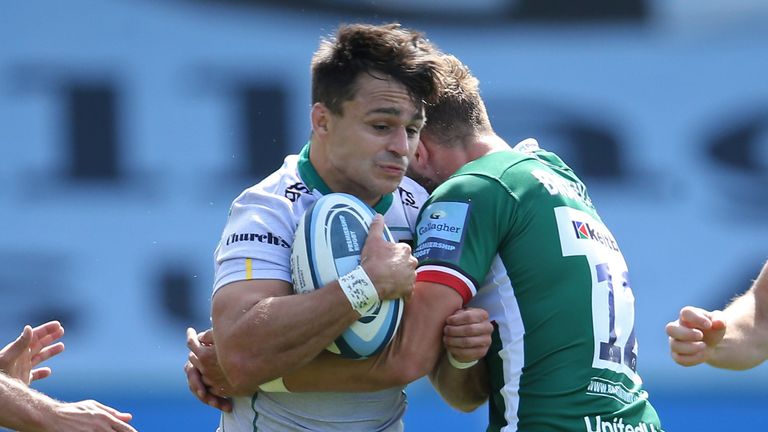 LONDON, ENGLAND - AUGUST 22: Tom Collins of Northampton Saints is tackled by Theo Brophy Clews and Ben Meehan of London Irish during the Gallagher Premiership Rugby match between London Irish and Northampton Saints at Twickenham Stoop on August 22, 2020 in London, England. (Photo by Steve Bardens/Getty Images)