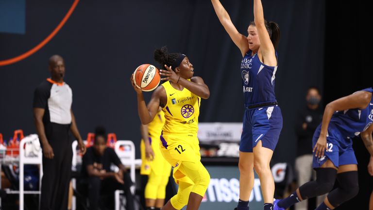 Chelsea Gray #12 of the Los Angeles Sparks handles the ball against the Minnesota Lynx on August 9, 2020 at Feld Entertainment Center in Palmetto, Florida. 