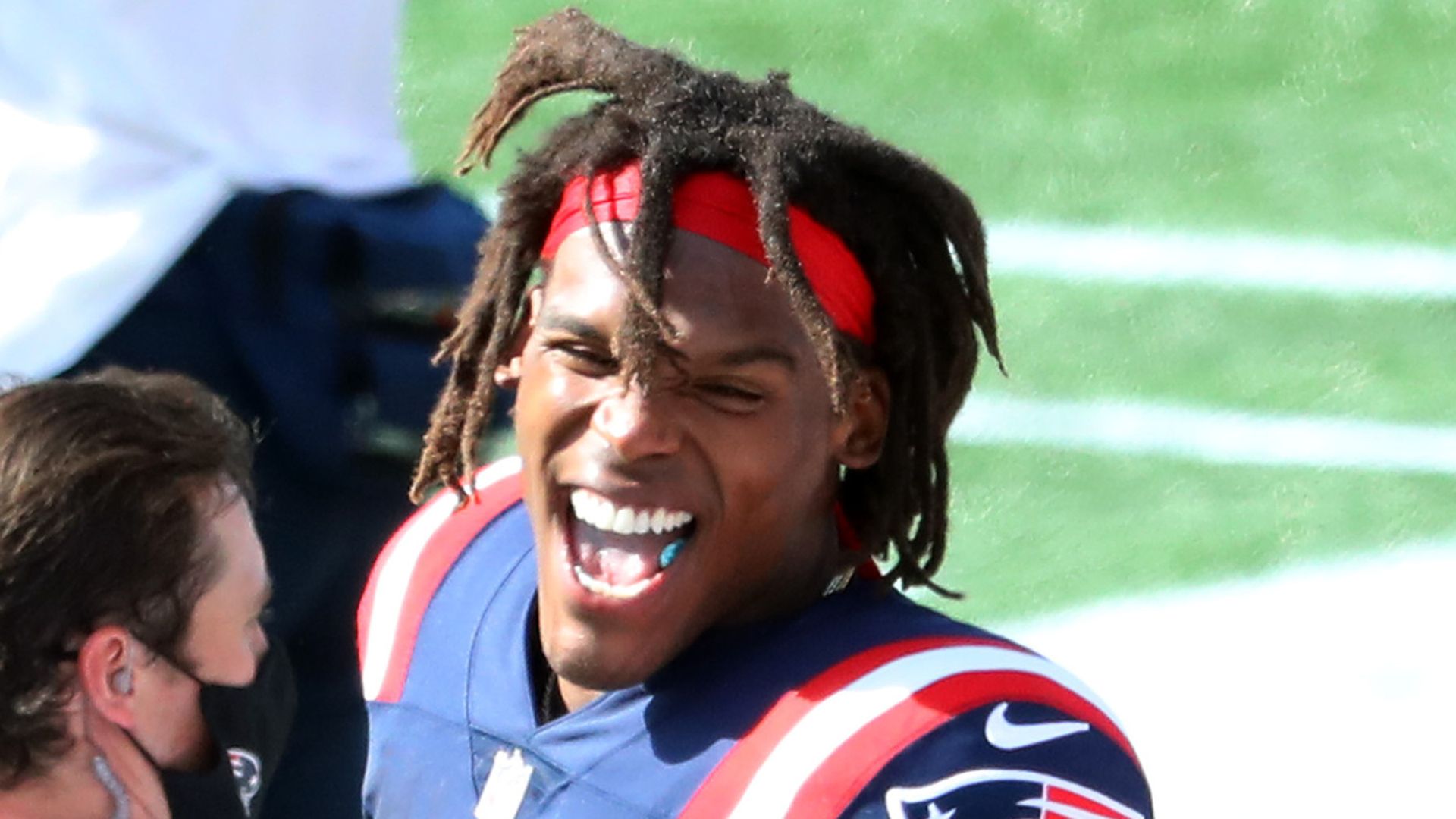 Newton leads Patriots to victory on debut