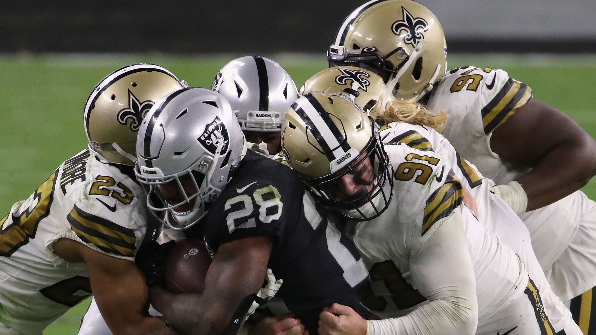Raiders open new Vegas home with Saints win