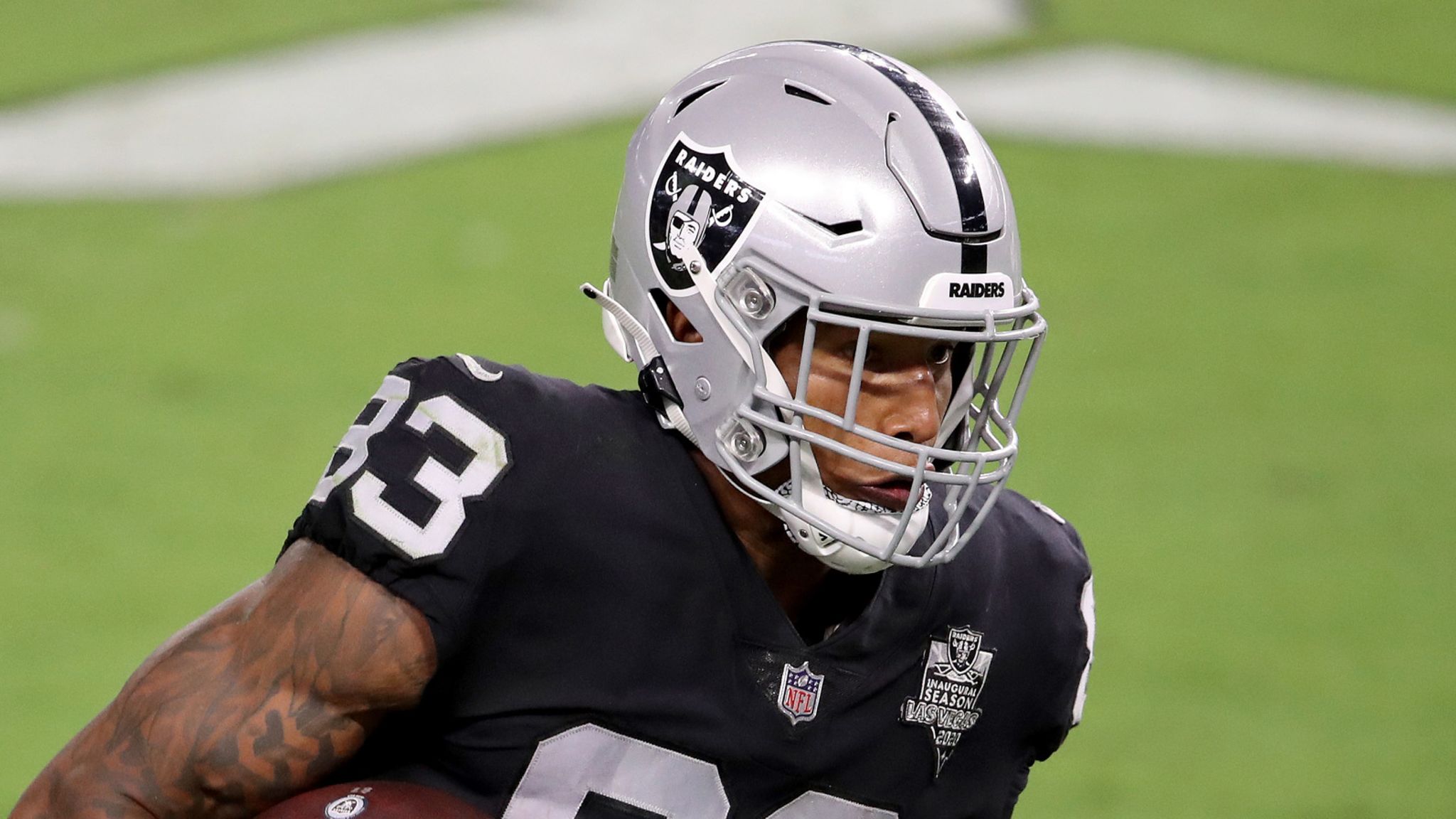 Darren Waller of the Las Vegas Raiders celebrates a touchdown with