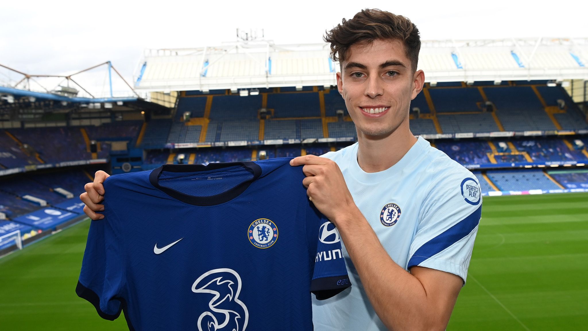 chelsea shirt signed by whole team