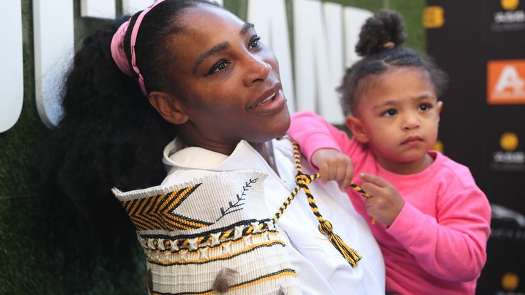 Serena Williams of the US with her daughter Alexis Olympia give an interview after her win against Jessica Pegula of the US during their women's singles final match during the Auckland Classic tennis tournament in Auckland on January 12, 2020